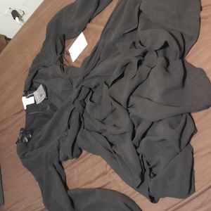 Black dress with ruffles.